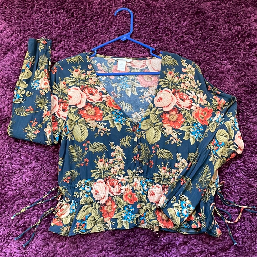 H&M cropped blouse; floral; scrunched waist, buttons on front; ties on the side.